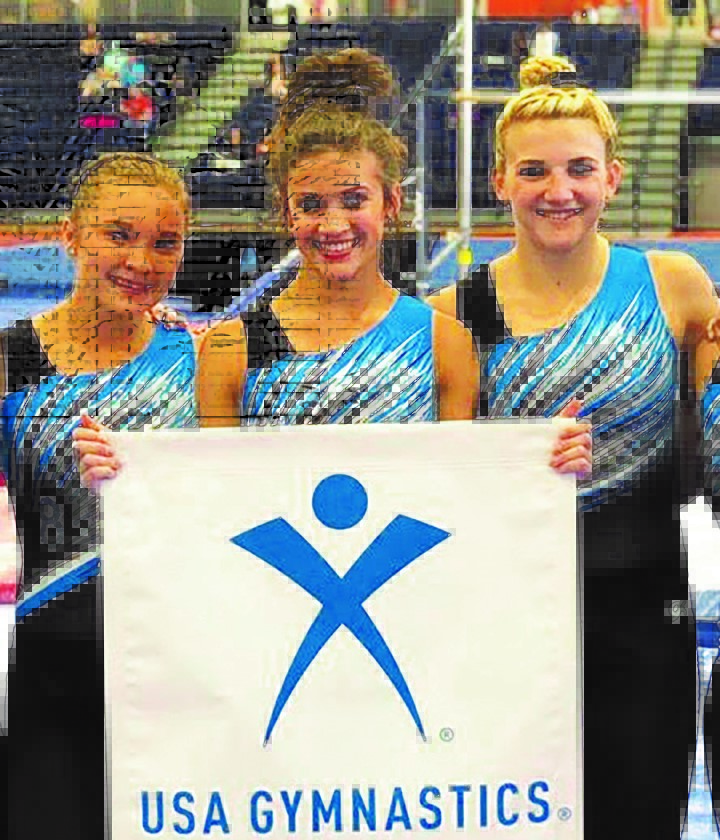 Gymnast Competitors Stick Landing Together On College Team In South